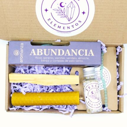 Ritual de prosperidad con aventurina, palo santo, sal marina, laurel y vela de miel