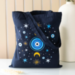 Bolsa tote azul con diseño de Ojo Turco y simbolos celestiales