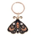 Llavero polilla folk esmaltado negro y dorado